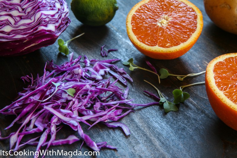 sliced red cabbage with cara cara oranges and lime