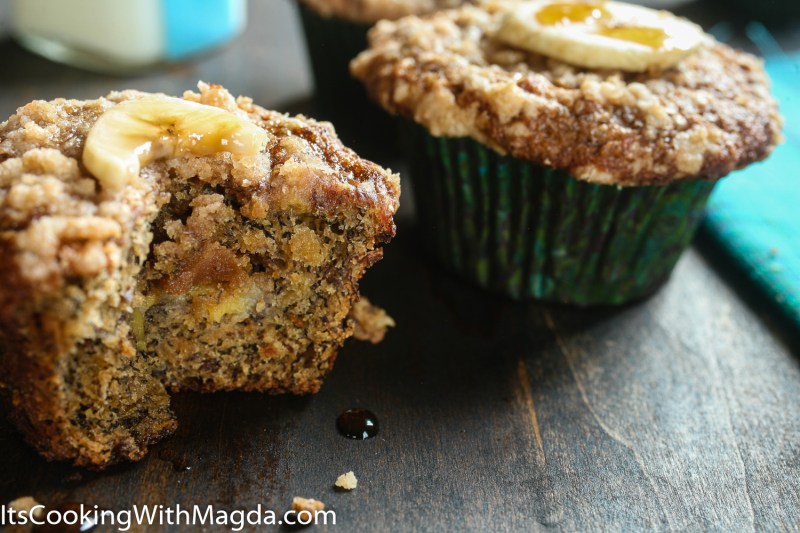 banana muffins with a dollop of peanut butter inside and a slice of banana