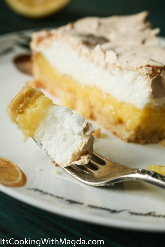 Meyer lemon meringue tart slice on a plate