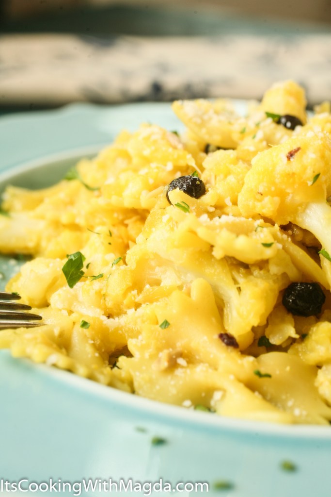 farfalle pasta with cauliflower, dried blueberries, sunflower seeds and Parmesan cheese