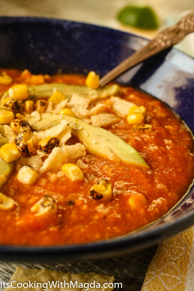 Tortilla soup with avocado, chips and fire roasted corn