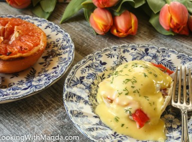 Eggs Benedict with smoked salmon and broiled grapefruit