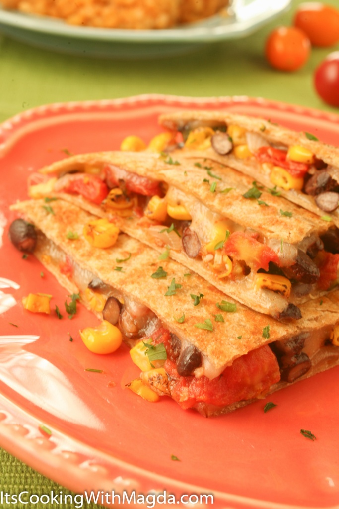 cheese and vegetable quesadilla with a serving of spanish rice