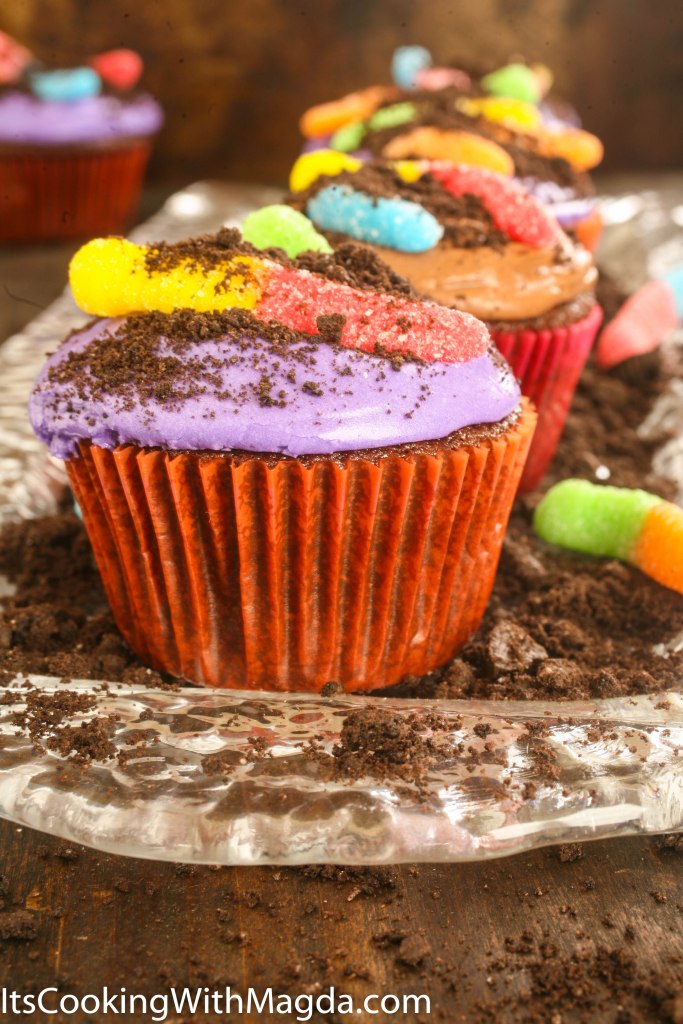 Dirt worm cupcakes on a platter