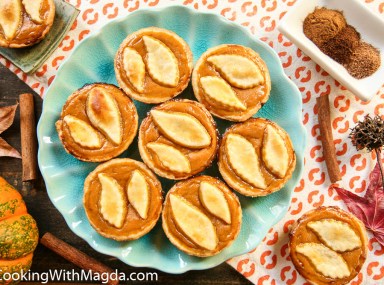 mini pumpkin pies on a blue plate