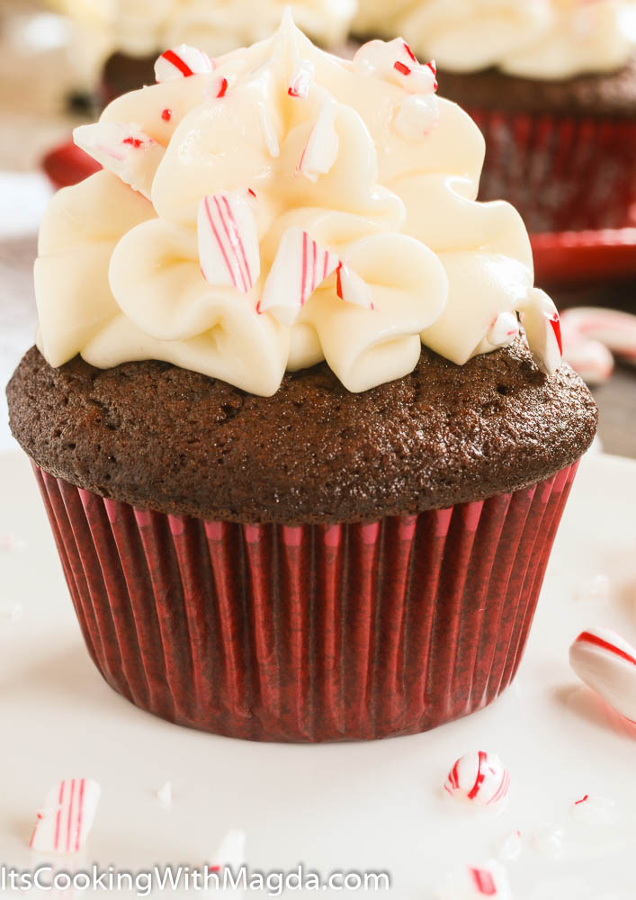 Chocolate cupcakes with white chocolate frosting and crushed candy cane