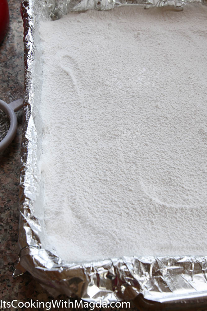marshmallow batter covered with powdered sugar