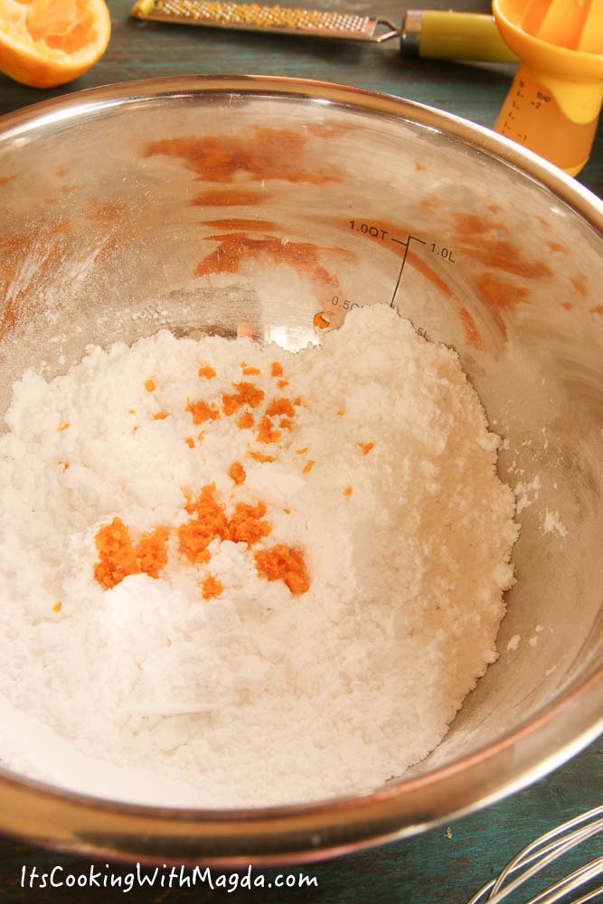 powdered sugar and lemon zest in a bowl