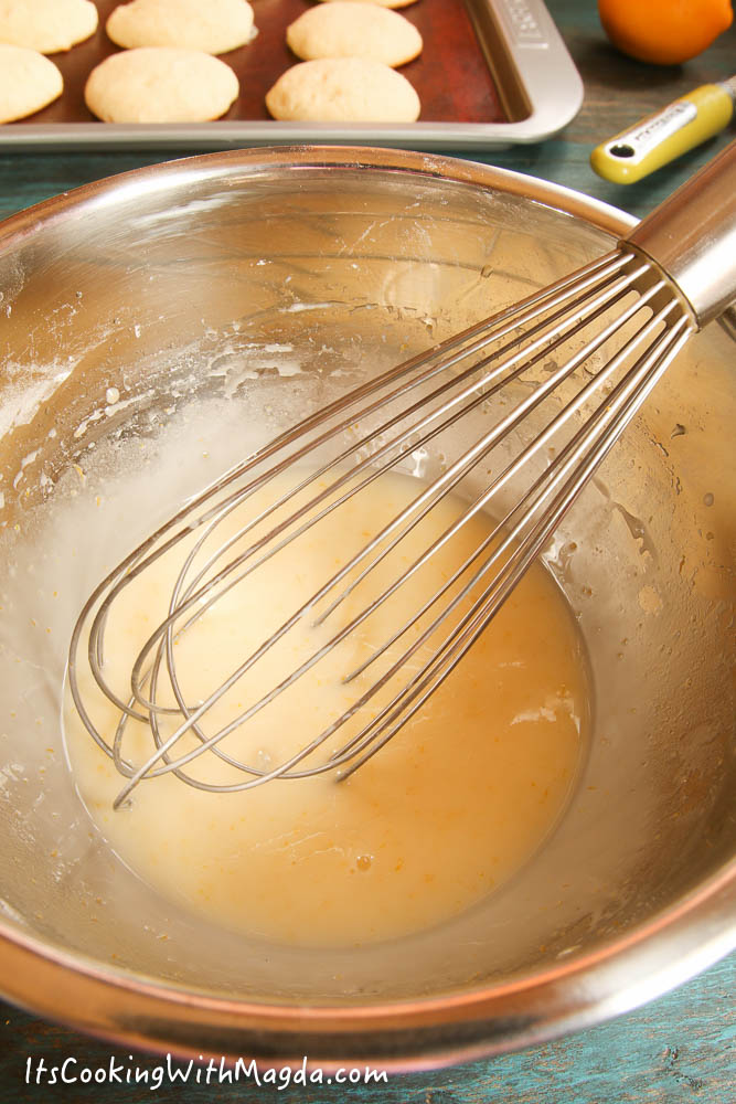 whisking lemon glaze