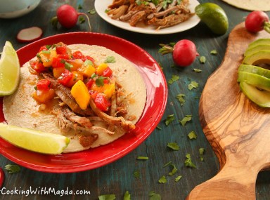pork taco with mango avocado salsa