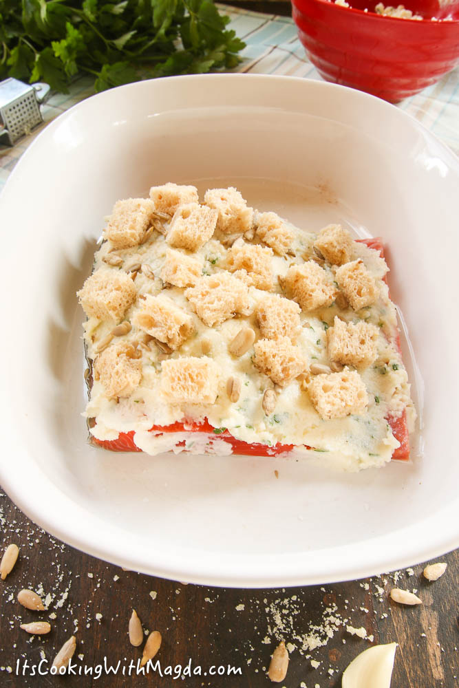 bread cubes pressed onto the cheese mixture on salmon