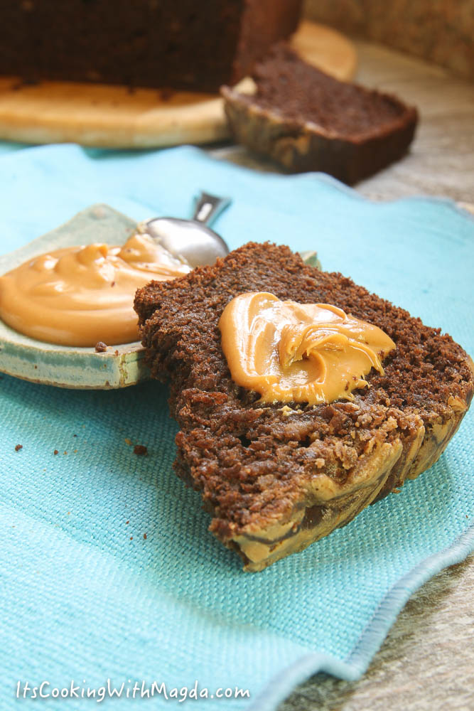 a slice of banana, chocolate bread with peanut butter