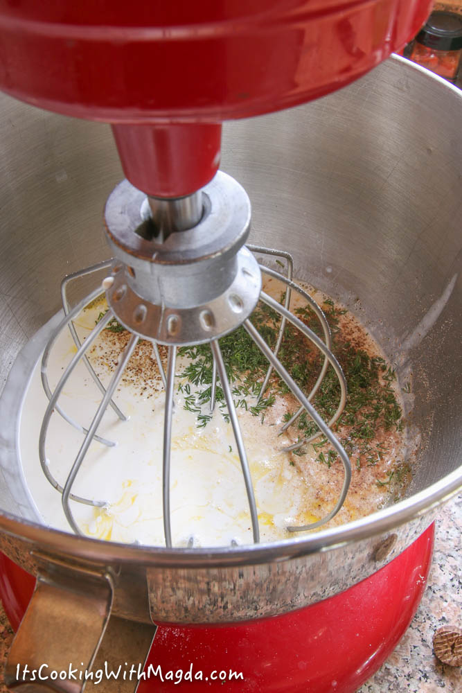 eggs, cream, milk and spices in a stand mixer bowl