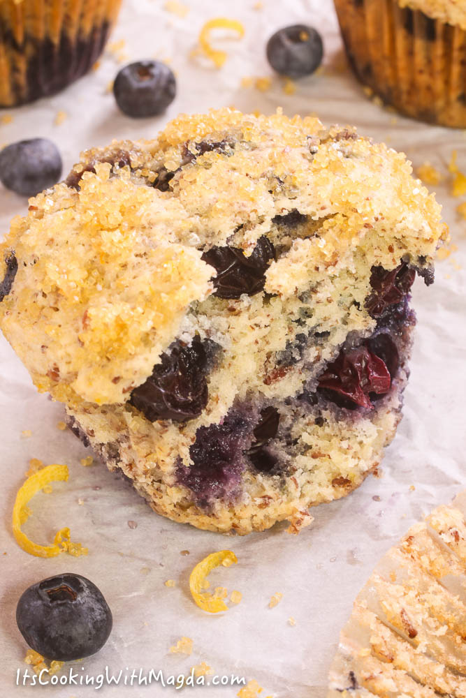 blueberry muffin with ricotta cheese, halved