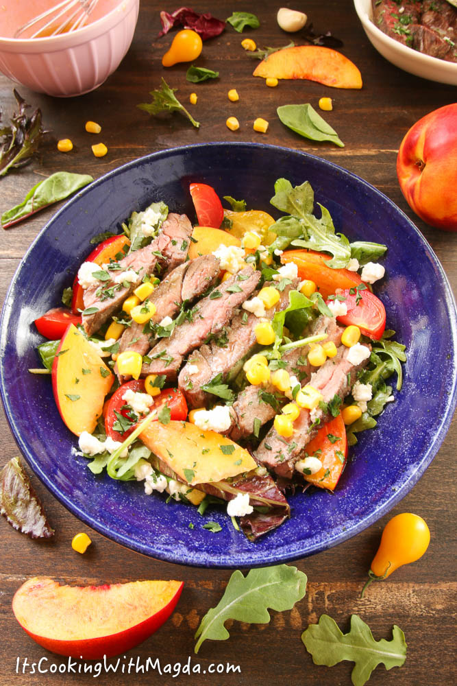 grilled skirt steak salad with nectarines, corn and goat cheese